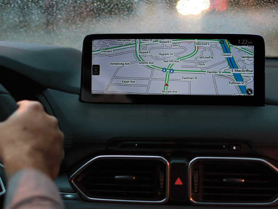 Mazda Connect dashboard console displaying infotainment apps