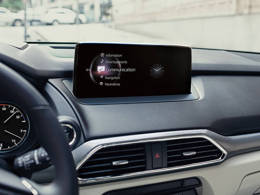 Dashboard Mazda Connect console with communication option highlighted