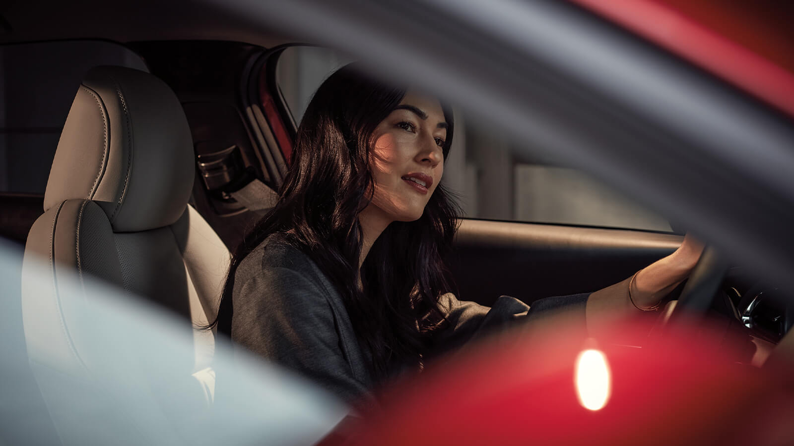 Close-up of woman in cockpit driving