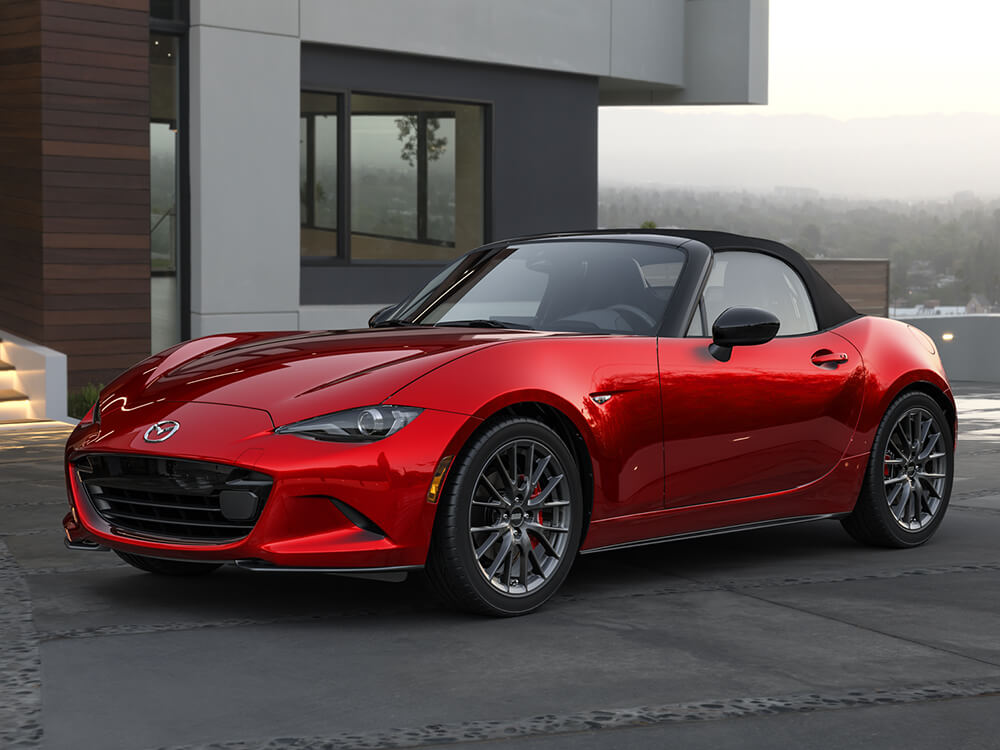 Mazda MX-5 à toit souple GS-P de couleur rouge vibrant cristal avec Groupe sport.